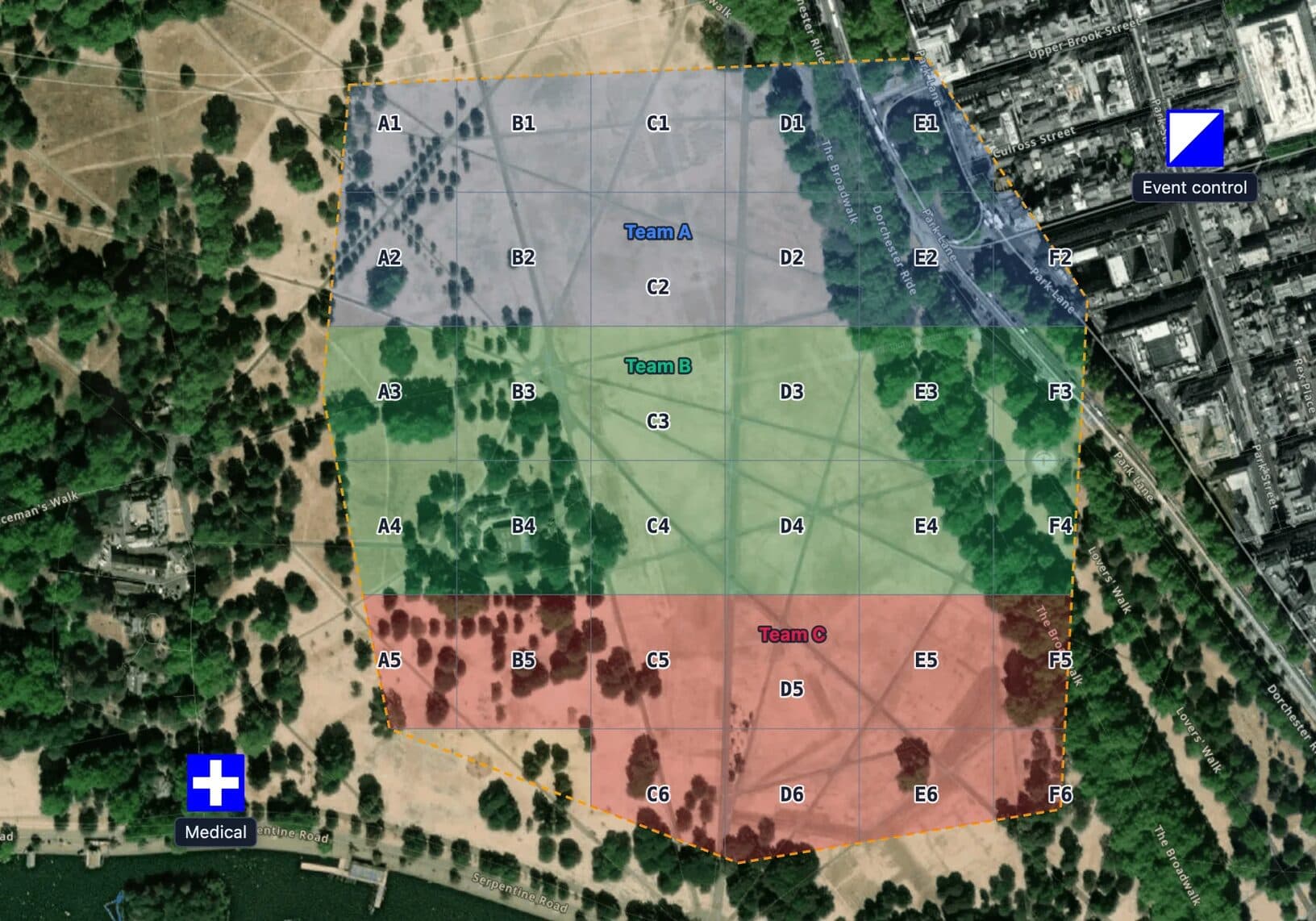 Festival security plan map on satellite imagery of a park in MapGridder: a dashed event footprint split into lettered squares A1 to F6, painted blue for Team A, green for Team B and red for Team C, with a Medical symbol outside the footprint and an Event control symbol beside the adjacent streets.