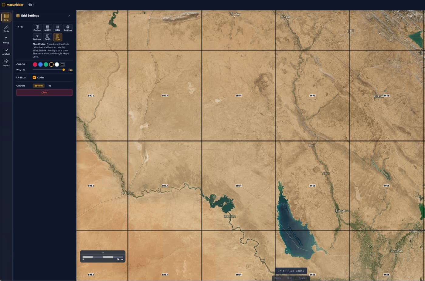 MapGridder with the Plus Codes grid type selected, showing 1-degree cells over satellite imagery of Iraq, each labeled with a four digit prefix like 8H74